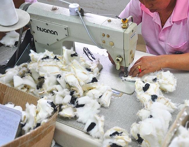 Sewing line stitching plush toy panels for bulk production