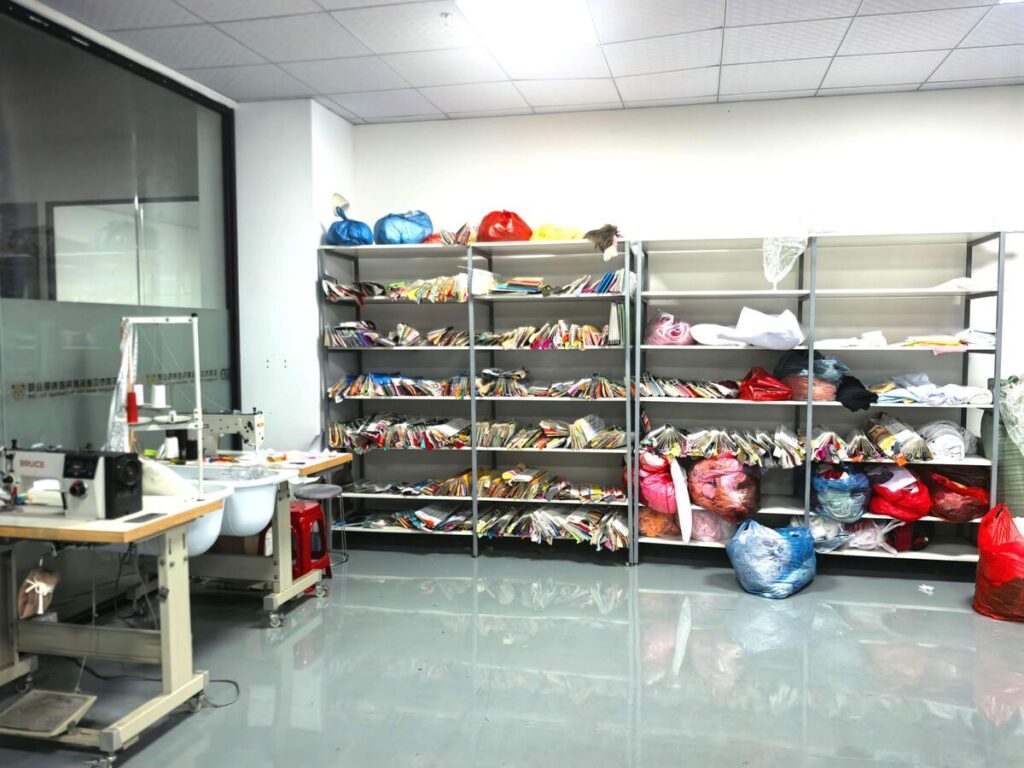 Pattern room at the JoyPlush plush toy factory with fabric and pattern storage shelves